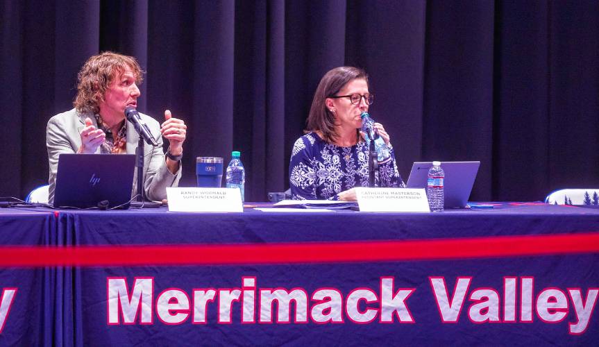 Merrimack Valley Superintendent Randy Wormald and Assistant Superintendent Catherine Masterson discuss the two different options for cuts in the school budget for the district at the school board meeting at the high school on Monday night, March 24, 2025.