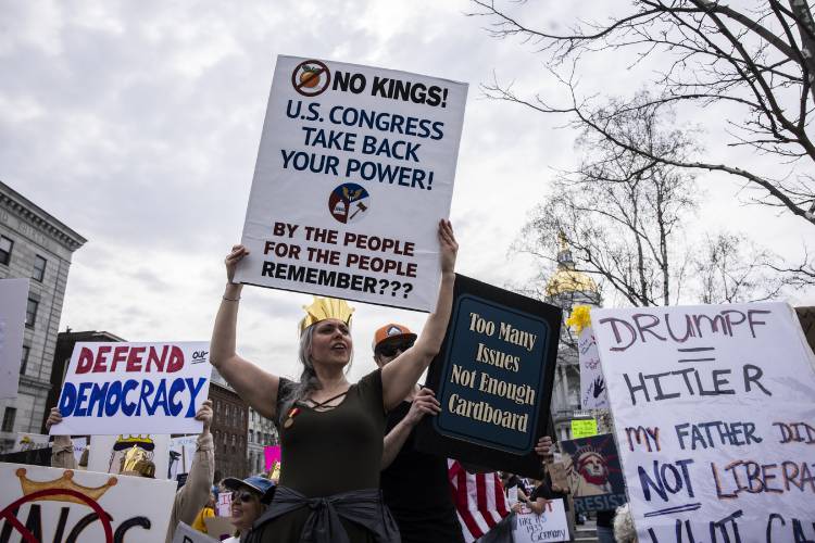 Andrea Garneau came out to the âHands Offâ protest at the State House on Saturday, April 19, 2025.