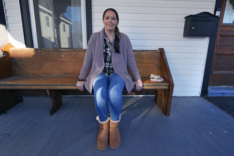 Kristina Amyot sits on the porch of a sober-living home, where she resided for about two years, at the Hope on Haven Hill, a residential, outpatient and recovery support service provider for pregnant, post-partum and parenting women, Friday, Jan. 12, 2024, in Rochester, N.H. Amyot, 36, spent more than half her life struggling with addiction, mainly to heroin. Drug overdose deaths in New Hampshire have increased in recent years, and some residents want to hear more from the...