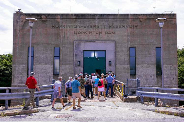 People on the tour of the gatehouse of the Hopkinton Dam on Route 127 in Contoocook on Saturday, July 20, 2024. The Hopkinton-Everett Lakes project provides flood protectionon the Contoocook and Piscataquog rivers, which are tributaries of the Merrimack River.