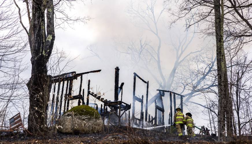 A fire at 100 Chase Farm Road in Hopkinton on Monday afternoon drew firefighters from around the area as flames spread from a garage to surrounding brush and fields.