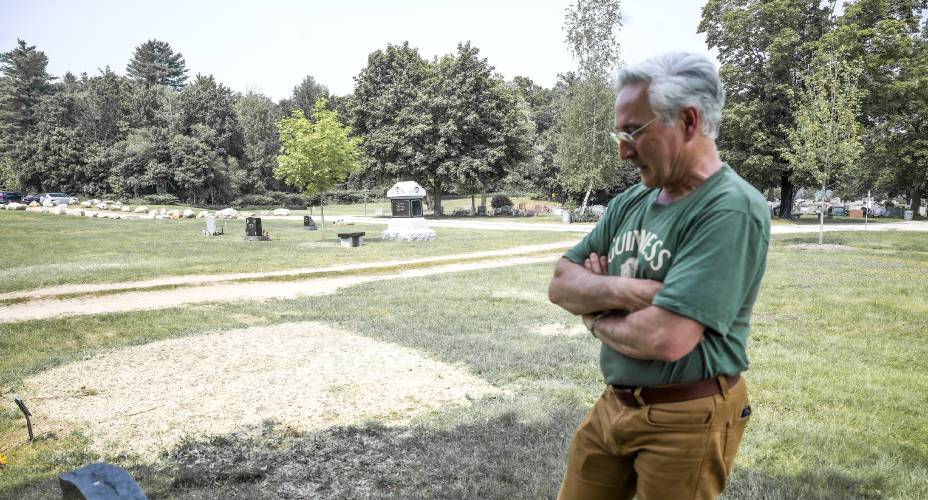 Bill Byrne looks over the burial plots for his daughter, Julia, and grandson, Blake at Blossom Hill Cemetery in Concord on Wednesday, June 4, 2025. Byrne’s daughter, Julia, 26, took the life of her 3-year-old son, Blake, and then her own.
