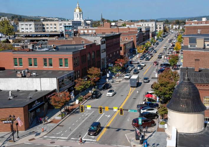 Main street Concord taken from the balcony of the Hotel Concord. In 2015 construction started on a redesign that along with many other things brought four lanes of traffic down to two and widened sidewalks.