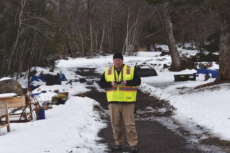 Mike Dunn, a commercially licensed drone pilot, readies a drone to fly over the woods in a search for Ashley Turcotte, a 31-year-old Barnstead woman who went missing on Jan. 4. A candlelight event called 