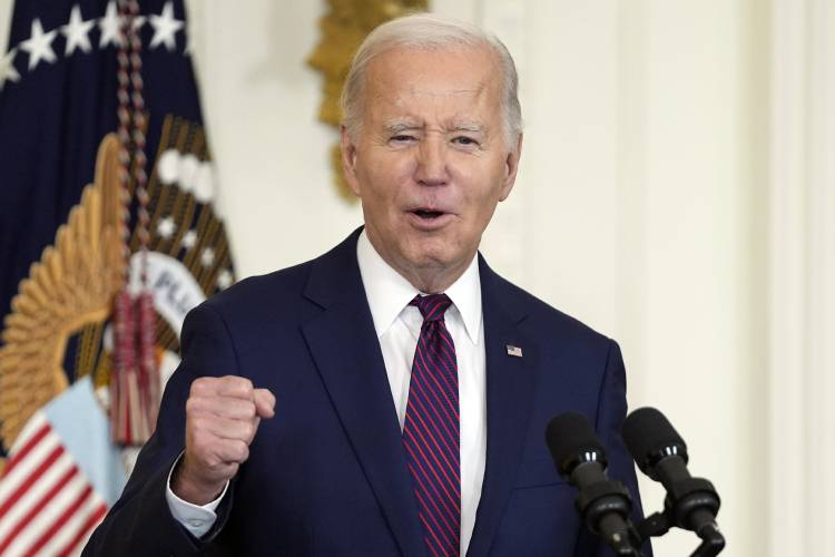 FILE - President Joe Biden speaks in the East Room, Jan. 19, 2024, in Washington. The New Hampshire attorney general's office says it is investigating reports of an apparent robocall that used artificial intelligence to mimic Biden's voice and discourage voters in the state from participating in the primary election on Tuesday, Jan. 23. Attorney General John Formella said Monday, Jan. 22, that the recorded message that was sent Sunday appears to be an illegal attempt to disrupt and...