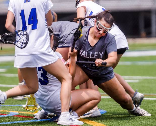 Merrimack Valley senior attacker Alyssa Brodeur gets in the thick of it to get a ball in the first half of the Division II  semifinals against Merrimack on Sunday. MV went on to win and will face No. 1 Winnacunnet at Bedford High School on Tuesday in the championship.