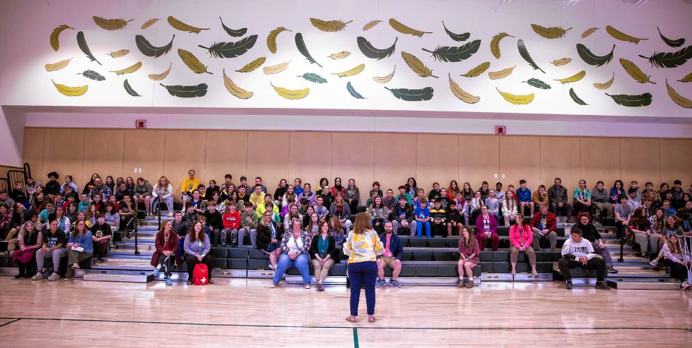 Allenstown principal Shannon Kruger greets students to the school gymnasium on Thursday morning, April 18, 2024. A group of students came to the Allenstown Community School for a greeting and a tour of the new facility.