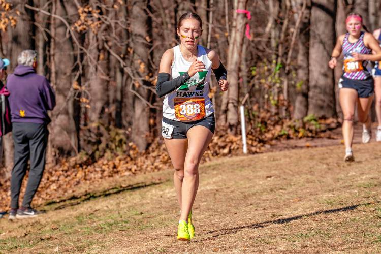 Hopkinton’s Maddy Lane races at the New England Interscholastic Cross Country Championship on Saturday at Wickham Park in Manchester, Conn. Lane ran the 5K in 18:22 to finish fifth in New England, the second-fastest N.H. runner across the line.
