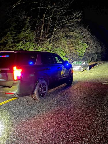 State Police arrested a Mass. woman for driving south in the northbound lanes of I-93 early Wednesday morning.