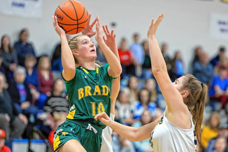 Bishop Brady junior Payton Bryson floats up a shot against Bow on Feb. 9, 2024.