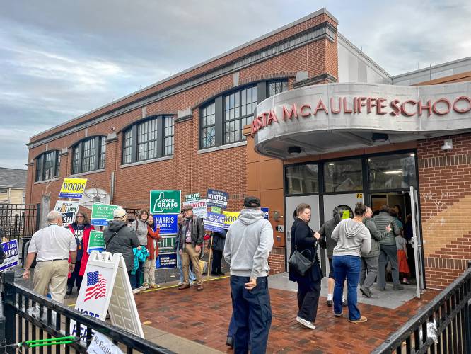 The line into the Ward 5 polls at Christa McAuliffe School at 7:25 a.m. Tuesday.