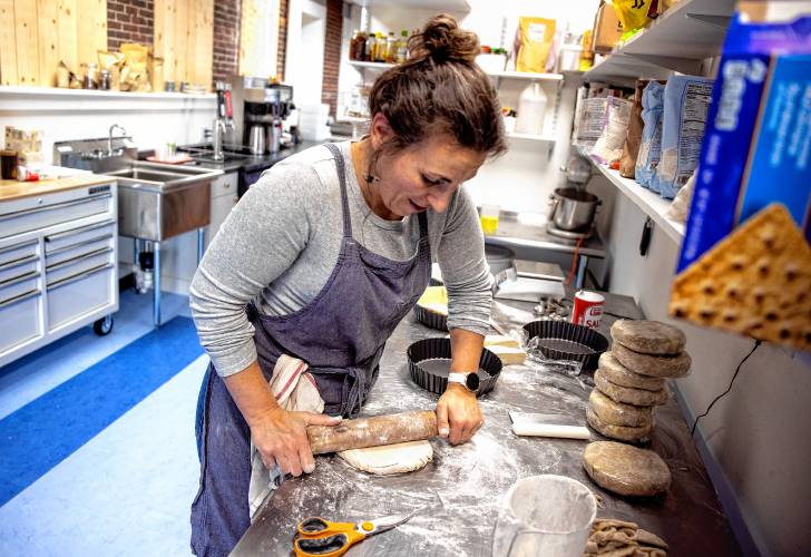 Chelsea Annett rolls out dough to make quiche crusts in her kitchen at Table on Wednesday, November 20, 2024. Annett opened Table, located in Concord’s Eagle Square, in July.