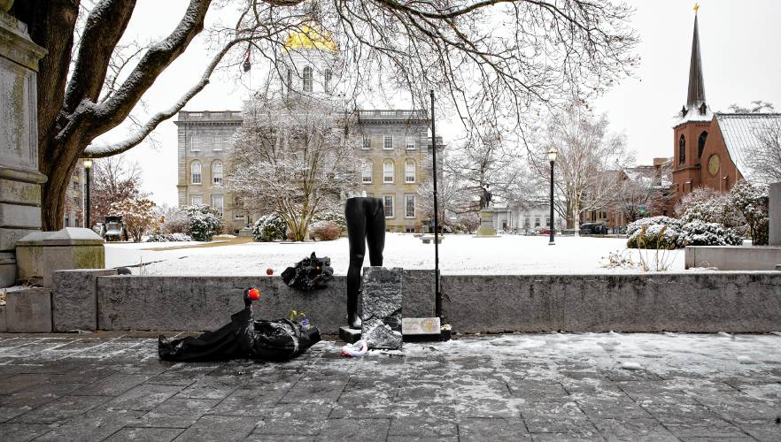The Satanic Temple holiday display was up for less than 48 hours, before it was vandalized again on Monday night. The torso of the display lays on the ground, the goat head on the wall and the legs were left standing.