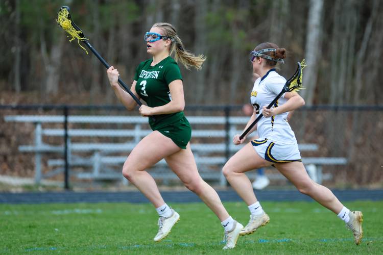 Hopkinton's sophomore midfielder Autumn Meier (left) scored a hat-trick for the Hawks at Bow on Monday.