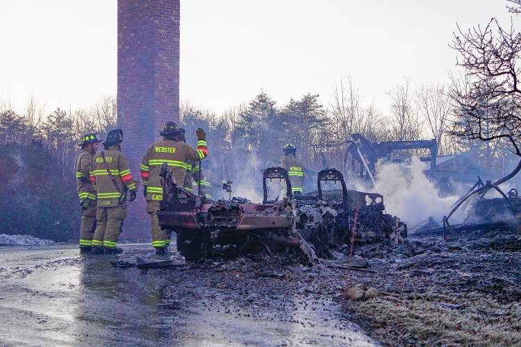 Due to high winds, a fire that began in the garage quickly spread to the entirety of a four-bedroom home on Barton Corner Road in Hopkinton Wednesday afternoon. Its occupants, a woman and two dogs, were able to safely evacuate, according to Hopkinton Fire Department, but the home was destroyed. 