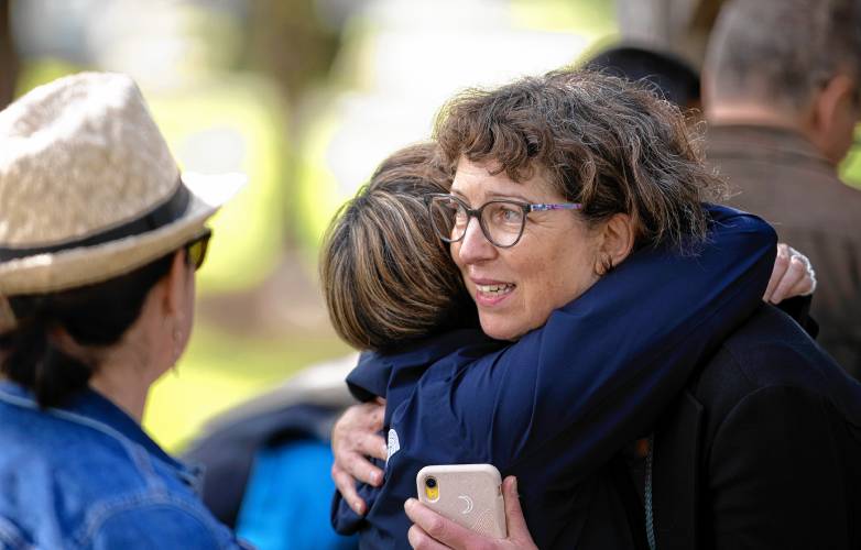 Marsha Filion gets a hug at the memorial for her mother, Barbara Filion,  at the Newcastle Commons on Sunday, June 8, 2024.