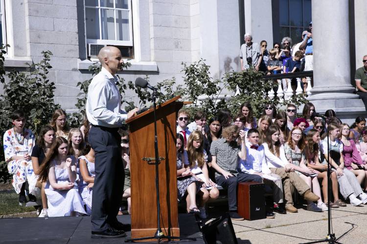 Artist Benjamin Victor, the sculptor of the statue of Christa McAuliffe, speaks to the crowd at the unveiling on Monday, September 2, 2024.
