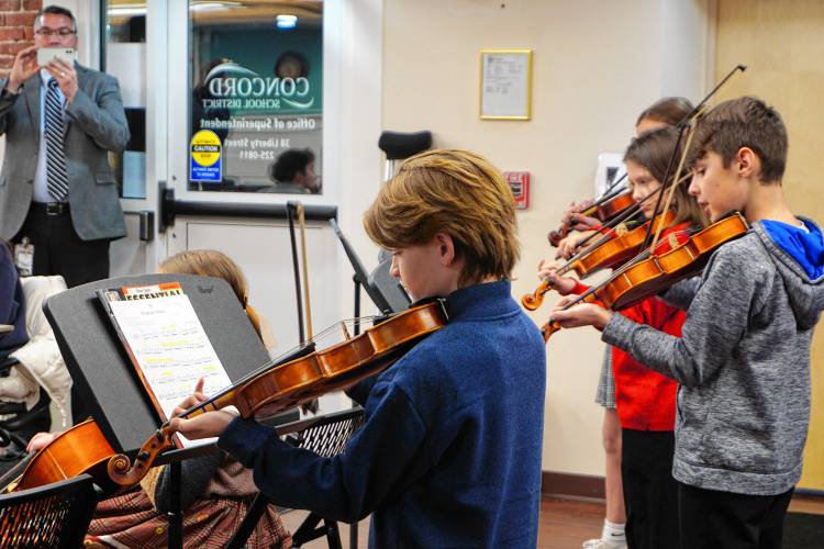 A string ensemble of students from Broken Ground Elementary School delighted members of the Concord School Board Monday night with performances of 