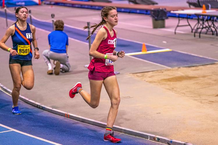 Concord's Shelly Smith races in the 2 mile at the New England Interscholastic Indoor Track and Field Championship on Saturday at the Reggie Lewis Track and Athletic Center in Boston. Smith finished 10th.