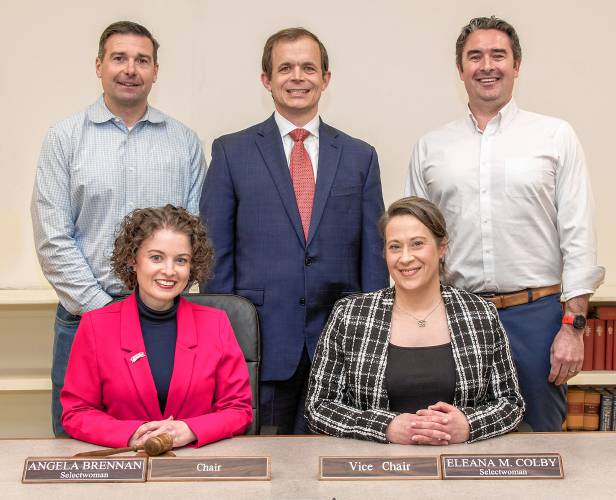 The Bow Board of Selectmen. Seated on the left is Chair Angela Brennan and Vice Chair Eleana Colby, Standing from left to right is Ian Flanagan, Christopher Nicolopoulos and Kip McDaniel.