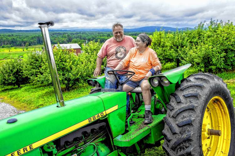 Chuck and Diane Souther up on the hill overlooking Apple Hill Farm in East Concord. The pair have been farming for nearly 50 years and are thankful to the community through the ups and downs of local farming.