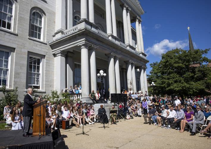 The crowd listens to Steven McAuliffe as he gives his speech about his wife, Christa McAuliffe, at the dedication of the statue in her honor on Monday, September 2, 2024, which would have been her 76th birthday.