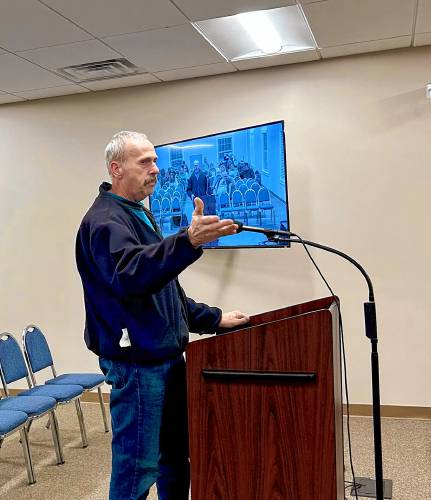 Loudon resident Rick Bilodeau asks selectmen at a budget public hearing on Wednesday to look into the possibility of leaving their current school administrative unit after the Merrimack Valley School District disclosed it spent $2 million last year that it did not have.
