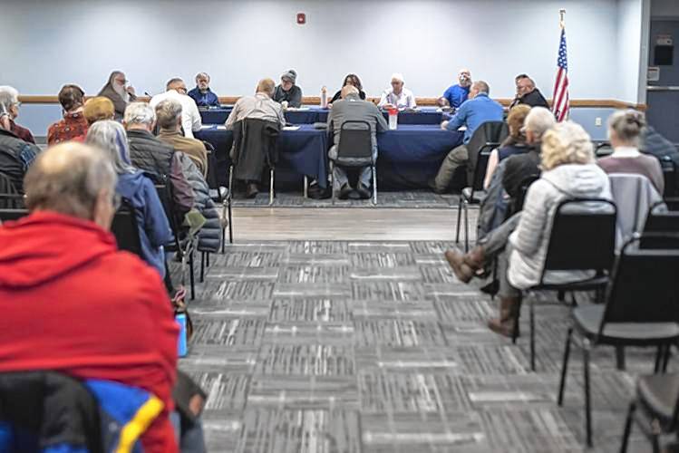 A crowd of 20 people attends a city council workshop at the Elks Lodge Monday night.