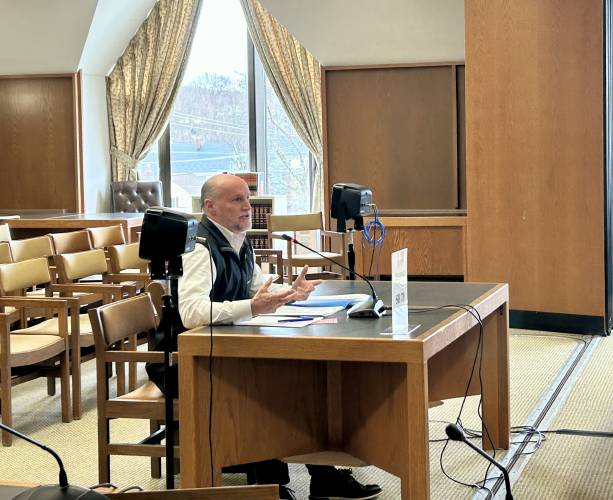 Lakes Region Sen. Tim Lang pitches his bill to a legislative committee to allow self-serve alcohol at licensed restaurants and bars throughout New Hampshire.