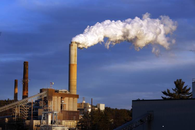 A plume of vapor billows from the coal-fired Merrimack Station in Bow. As Trump boosts coal, the owner says plans haven’t changed for the plant. A plume of vapor billows from the coal-fired Merrimack Station in Bow. As Trump boosts coal, the owner says plans haven’t changed for the plant.
