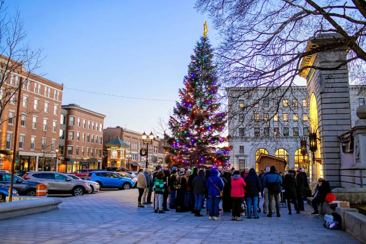 The crowd that came out to honor the homeless persons at City Plaza in front of the State House on Thursday evening, December 21, 2023.