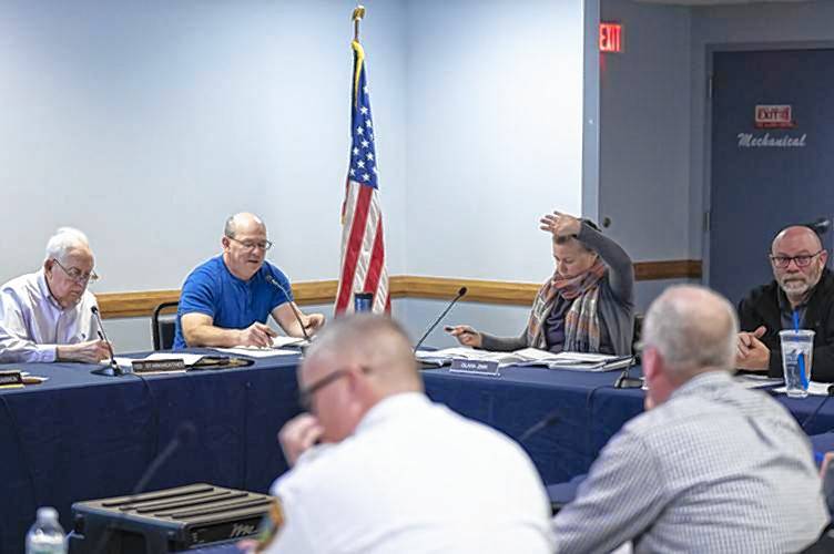 City councilors discuss the budget for renovations to Soldiers Memorial Hall in Franklin at a workshop at the Elks Lodge on Monday night.