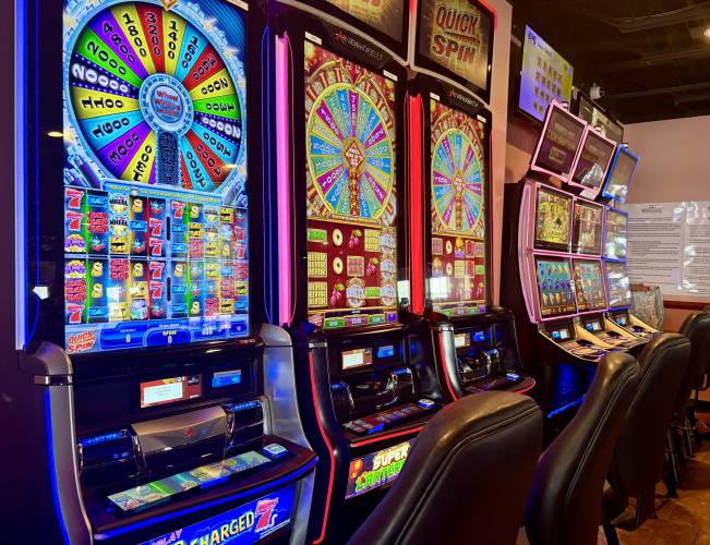 Historic horse racing machines, seen here at Ocean Gaming Casino in Hampton, look like slot machines, but the results are determined by the outcome of past horse races, not a random number generator. Historic horse racing machines, seen here at Ocean Gaming Casino in Hampton, look like slot machines, but the results are determined by the outcome of past horse races, not a random number generator.
