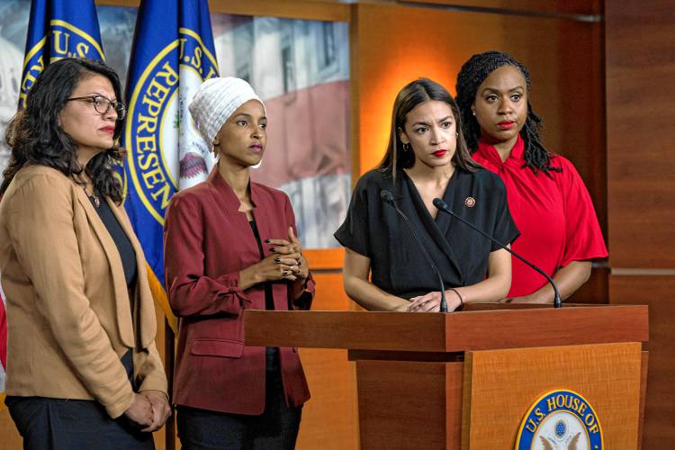 From left, Rep. Rashida Tlaib, D-Mich., Rep. Ilhan Omar, D-Minn., Rep. Alexandria Ocasio-Cortez, D-N.Y., and Rep. Ayanna Pressley, D-Mass., at the Capitol in Washington, Monday, July 15, 2019.