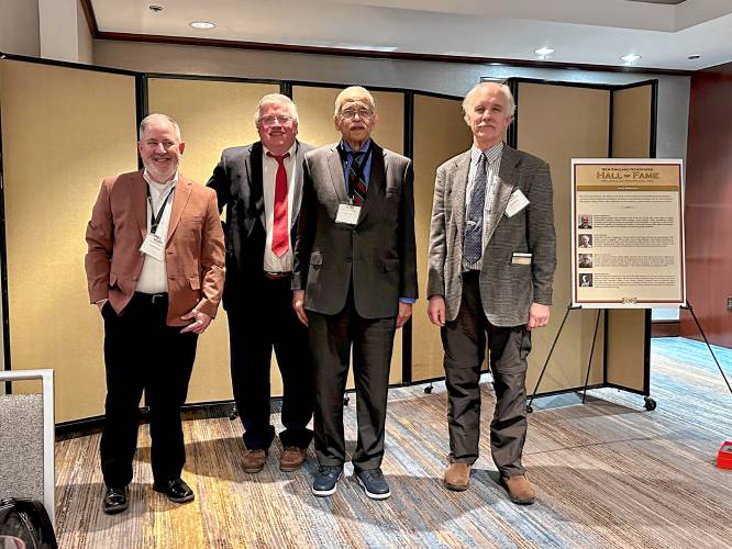 The New England Journalism Hall of Fame inductees included David Brooks, right; Melvin B. Miller of The Bay State Banner; Frank Dingley of the Lewiston Sun Journal, whose posthumous recognition was accepted by Steve Collins; and George Brennan of the Martha’s Vineyard Times.