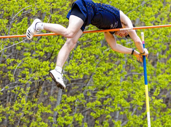 Bow’s Ben McDowell clears 13 feet, 6 inches in the pole vault during a track meet at Bow High School on Saturday. McDowell won the event and is currently the top-ranked vaulter in the state.