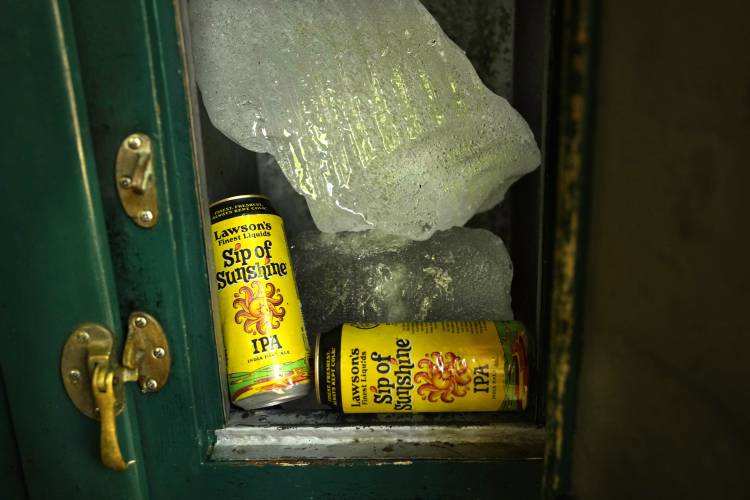 LEFT: Blocks of winter ice keep beverages cold in an old ice box.