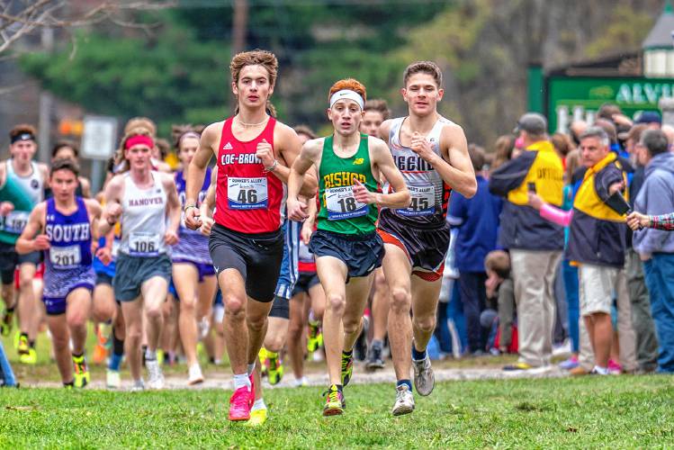 From left, Coe-Brown’s Jamie Lano, Bishop Guertin's Matthew Giardina and Keene’s Sully Sturtz lead the pack 800 meters into the boys’ race at the NHIAA Meet of Champions on Nov. 4. Lano finished seventh to lead area runners, one week after winning the Division II title, and qualified for New Englands.