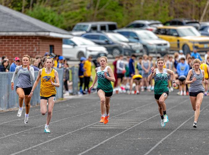 Bow’s Camden Wilson (second from left), and Pembroke’s Jasmine Blake (center) and Teagan Nyhan (second from right) compete in the 100-meter dash during a track meet at Bow High School on Saturday. Wilson finished second the 100 and 200, and won the high jump to help lead the Falcons to a win over Pembroke and Kingswood.