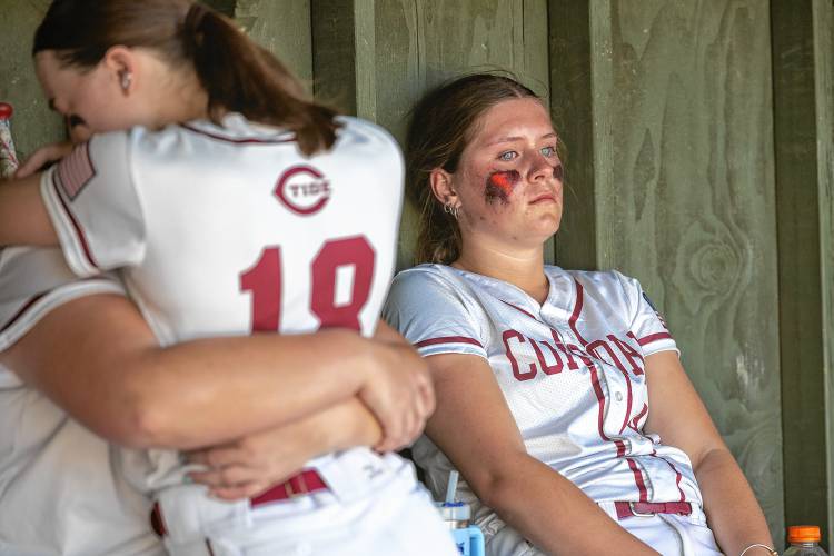 Concord senior Sarah Taylor sits stunned in the dugout after the Tide's 1-0 upset loss to No. 14 Portsmouth in the first round of the Division I NHIAA playoffs on Wednesday, May 29, 2024.