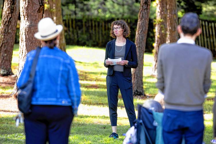 Marsha Filion speaks to the people gathered for the memorial for her mother, Barbara Filion,  at the Newcastle Commons on Sunday, June 8, 2024.
