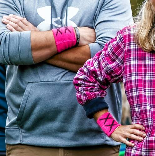 Protesters wear pink armbands on the sidelines of the Bow girls soccer game on Tuesday, September 24, 2024.