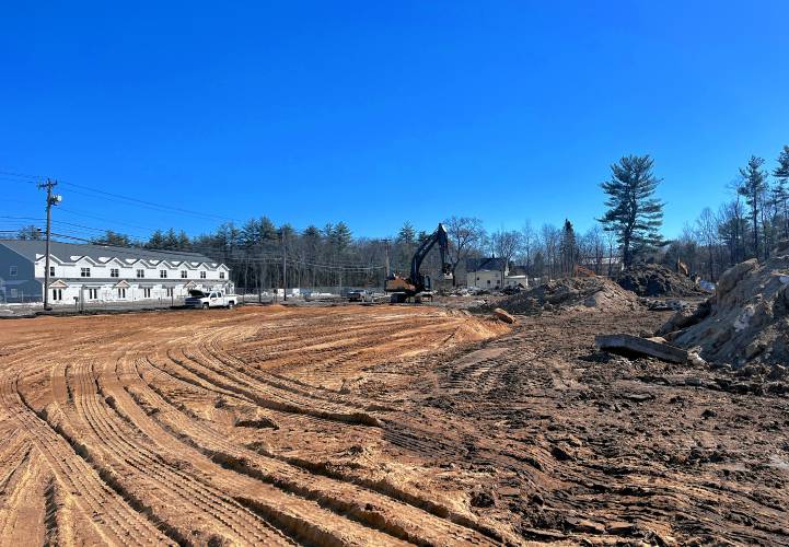 As construction begins on one side of Fisherville Road, condos across the street have just begun to go up for sale. 