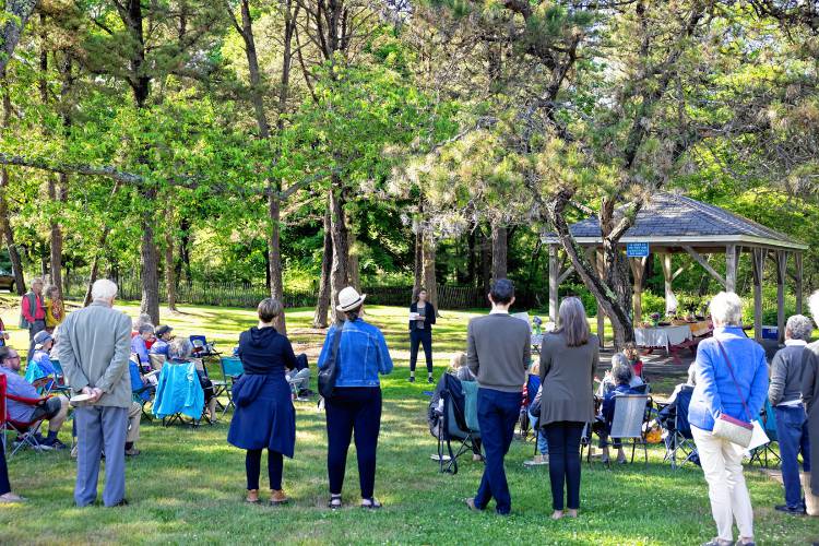 Marsha Filion speaks to the people gathered for the memorial for her mother, Barbara Filion,  at the Newcastle Commons on Sunday, June 8, 2024.