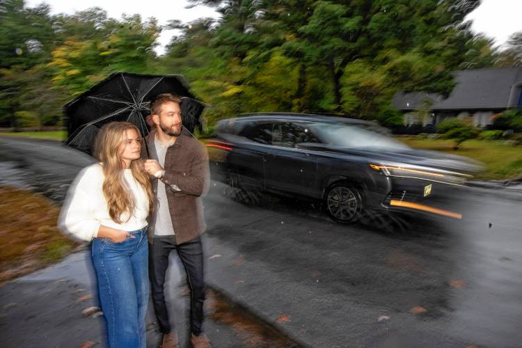 Lindsay Gray and Nate Veilleux outside their home in East Concord and have been surprised how fast people drive on a residential street. The cars cut through from Mountain Road over to Portsmouth Street.