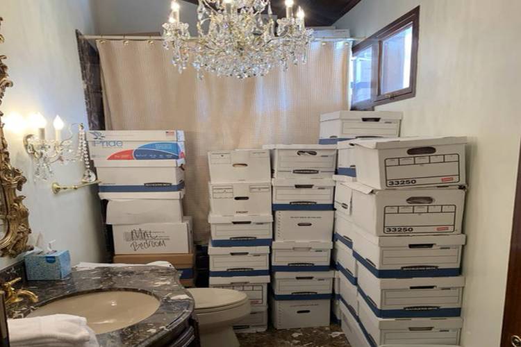 This image, contained in the indictment against former President Donald Trump, shows boxes of records stored in a bathroom and shower in the Lake Room at Trump's Mar-a-Lago estate in Palm Beach, Fla. This image, contained in the indictment against former President Donald Trump, shows boxes of records stored in a bathroom and shower in the Lake Room at Trump's Mar-a-Lago estate in Palm Beach, Fla.