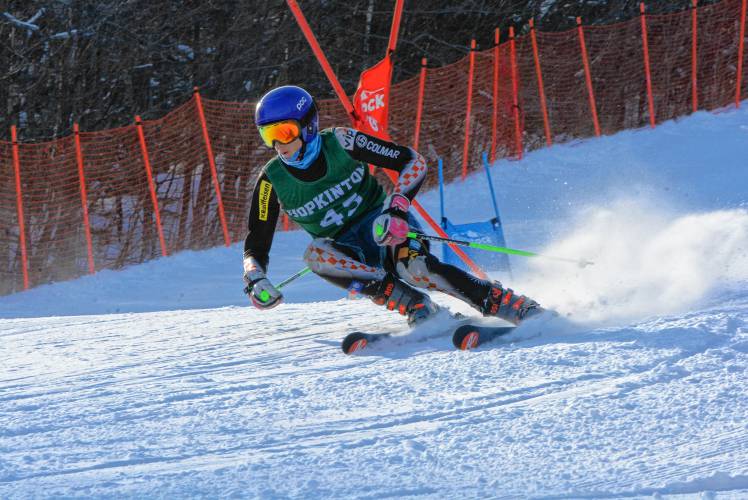 Hopkinton senior Merrick Chapin works his way down the course at Gunstock on Tuesday at the NHIAA Division III boys’ Alpine skiing championship. Chapin defended his title in the slalom and finished sixth in the giant slalom to lead Hopkinton to second place.
