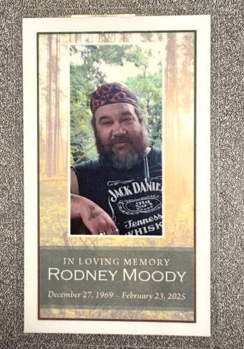 The memorial service for Rodney Moody brought out friends and part of the unhoused community on Saturday, March 30, 2025.  Moody died at the Concord Coalition to End Homelessnessâs winter shelter on February 23rd. After the service, a group walked in a procession from CenterPoint Church on North State over to the shelter in honor of Moody.