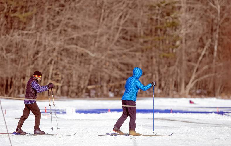 Cross country skiers make their way on The Concord Community Nordic Trails at Beaver Meadow Golf Course on Sunday.