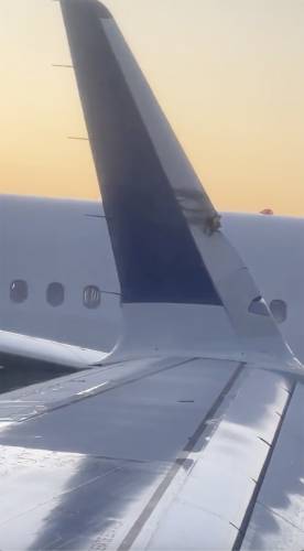 This image provided by Brian O'Neil shows a damaged plane's wingtip after two JetBlue planes made contact in a minor collision at Boston Logan International Airport on Thursday, Feb. 8, 2024 in Boston. An airport authority spokeswoman says one plane's wingtip touched another plane’s tail while both Airbus 321 jets were in the de-icing area. (Brian O'Neil via AP)